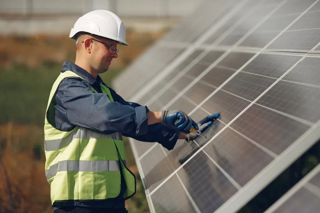 Large-scale commercial Solar PV array installed on a flat industrial roof in County Waterford.