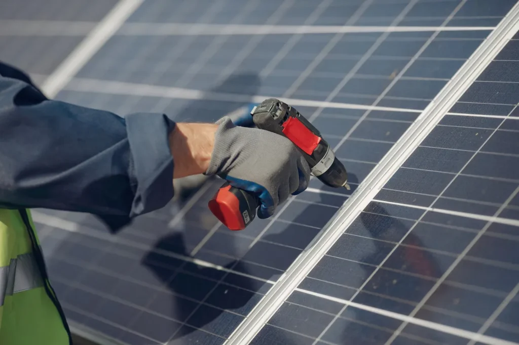 SEAI approved installer fitting domestic Solar PV panels on a residential roof in Waterford.